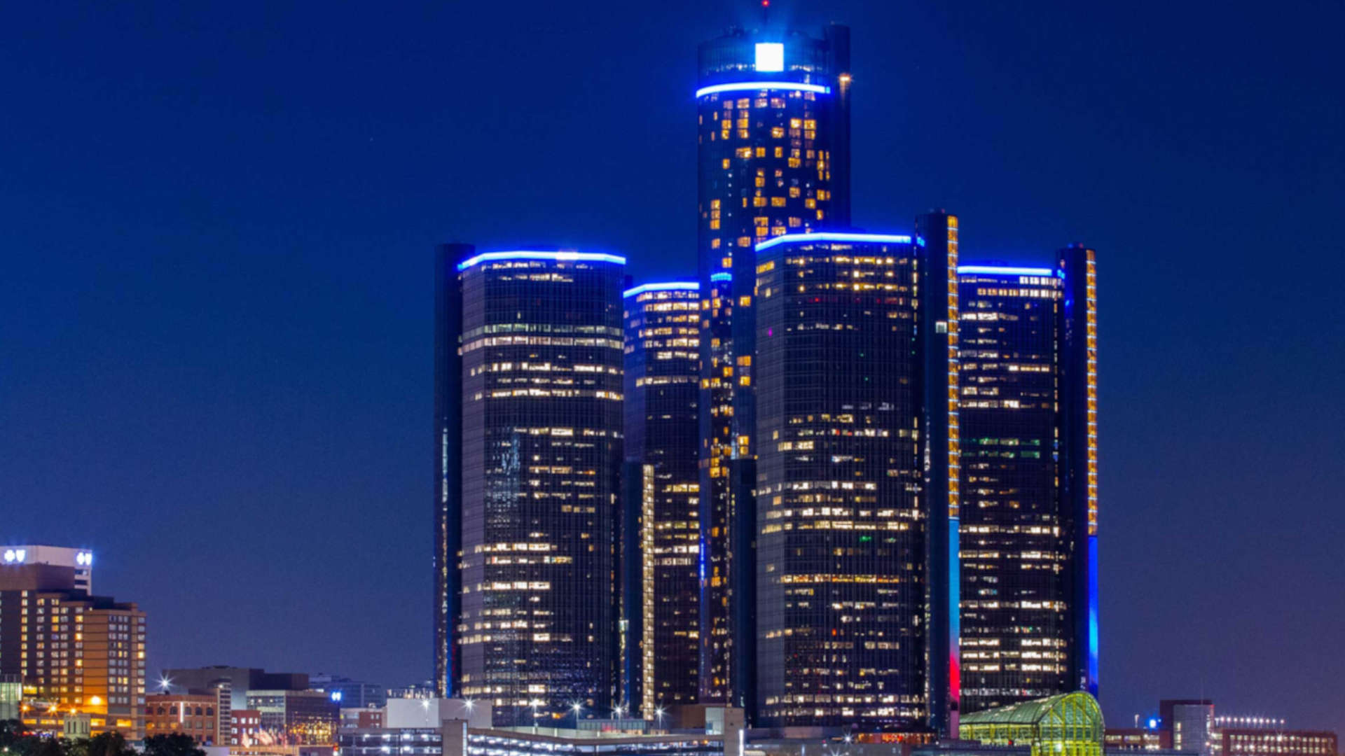 Photo of the Renaissance Center at night taken from Windsor, Ontario.